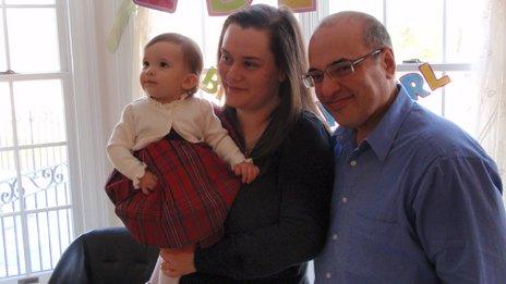 Joanna with her husband and daughter