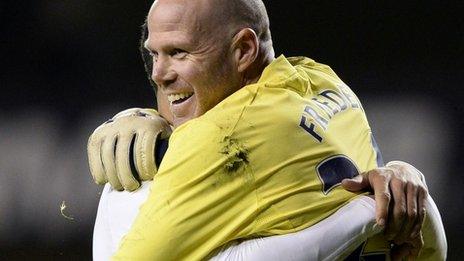 Brad Friedel celebrates Tottenham's Capital One Cup win