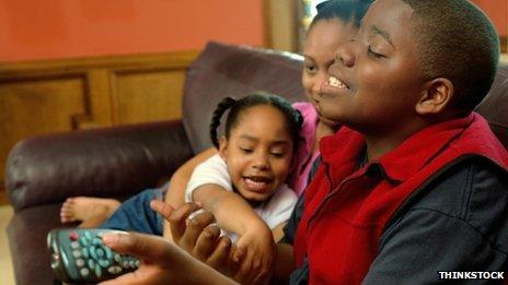 Children fight over the remote