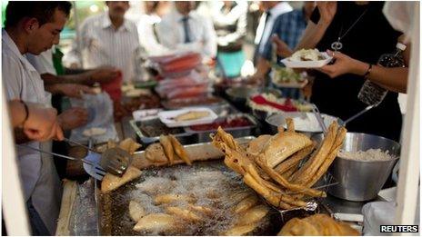 Mexican street vendors sell fried food