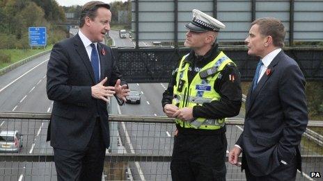 David Cameron and Welsh Secretary David Jones at the M4 outside Cardiff