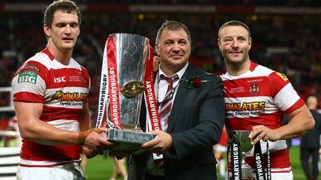 Sean O'Loughlin (l), Shane Wane and Blake Green (r) of Wigan