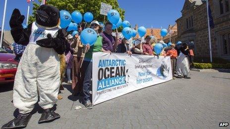 Supporters of the sanctuaries proposal rally outside meeting in Hobart