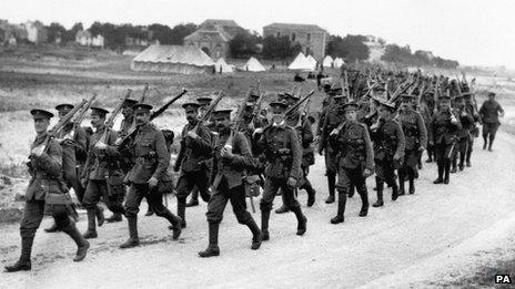 British infantrymen marching towards the front lines in the River Somme valley