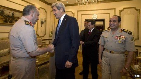 John Kerry meets members of the Egyptian military, including armed forces chief Gen Abdul Fatah al-Sisi in Cairo (3 November 2013)