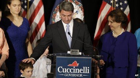 Ken Cuccinelli with his family as he makes a speech following his defeat