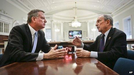 New York City Mayor-elect Bill de Blasio, left, join Mayor Michael Bloomberg for a meeting in the "Bull Pen," the mayor's main City Hall office 6 November 2013