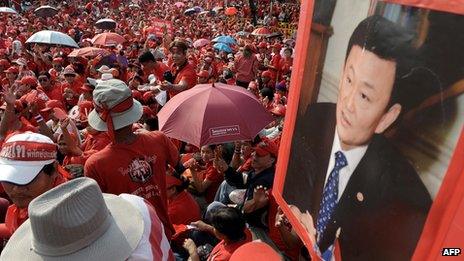 File photo: Supporters of Thailand's ousted prime minister Thaksin Shinawatra rally outside the Government House in Bangkok on 8 April 2009