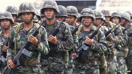 File photo: Thai soldiers march near a stadium in Bangkok, 20 September 2006