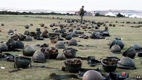 The ground where over 1,200 Argentinian soldiers surrendered to British forces and laid down their arms. The ground is littered with helmets, weapon magazines, ammunition and water bottles