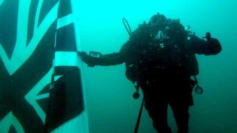 Diver with flag