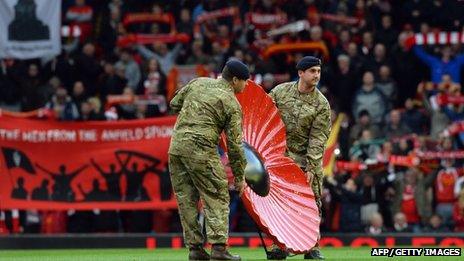 Football grounds across the UK, including Anfield in Liverpool (pictured) paused to hold a minute's silence