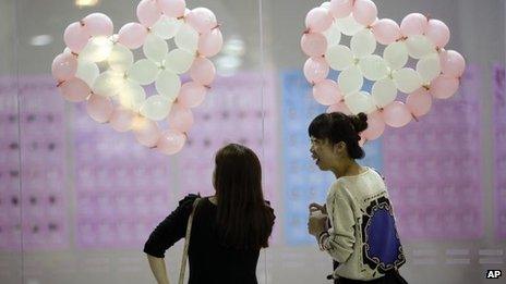 Participants take part in a bachelors' meeting event ahead of Singles Day