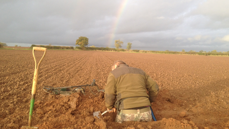 Man digging in the field