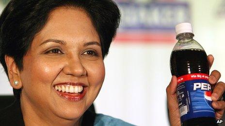 PepsiCo boss Indra Nooyi holding bottle of Pepsi