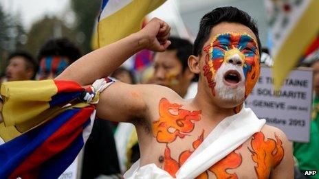 Tibetan activists hold a demonstration on 22 October 2013 outside the UN in Geneva.