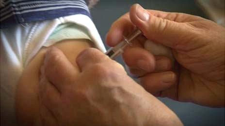 MMR vaccine being given to a baby