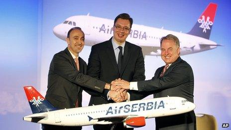 Dane Kondic, chief executive of Air Serbia, left, Serbia's deputy Prime Minister Aleksandar Vucic, centre, and Etihad Airways' James Hogan