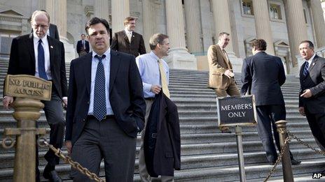 Members of the US House of Representatives depart the US Capitol on 15 November 2013