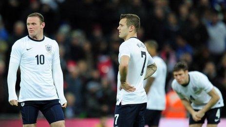 England's Wayne Rooney and Jack Wilshere