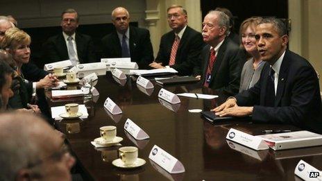 US President Barack Obama meets health insurance industry leaders in the Roosevelt Room of the White House on 15 November 2013