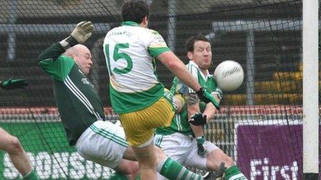 Michael Murphy scores a goal for Glenswilly against Roslea