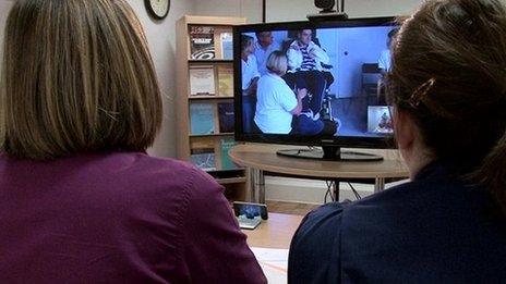 Doctors and patients using telemedicine