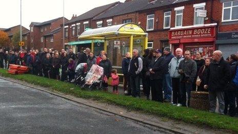 People line the streets of St Helens