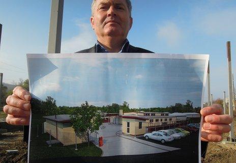Local councillor Ion Gangan with plans for a new covered market
