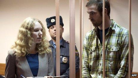 A handout picture released by Greenpeace shows British freelance videographer Kieron Bryan (R) attending a bail hearing in St Petersburg on November 18, 2013