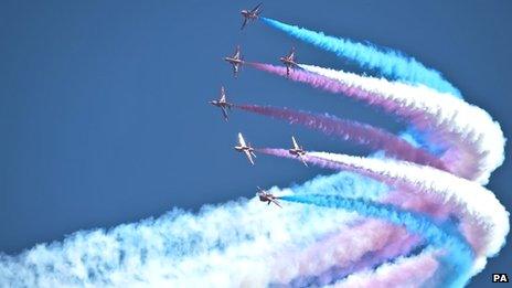 The RAF Red Arrows perform ahead of the Royal International Air Tattoo