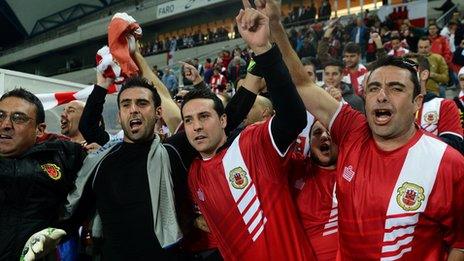 Gibraltar players and fans celebrate the draw with Slovakia