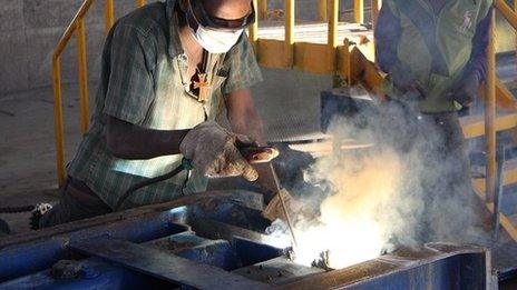 welder working on rail sleepers in factory near Mermesa, Ethiopia