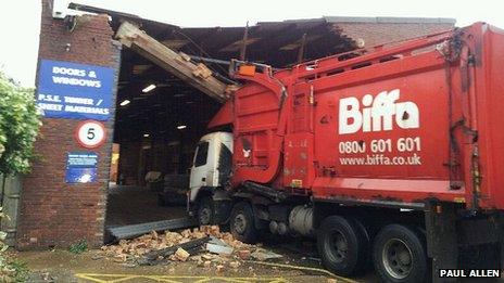 Truck in the front of the warehouse