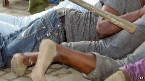Young men being arrested in Mombasa, Kenya - October 2013