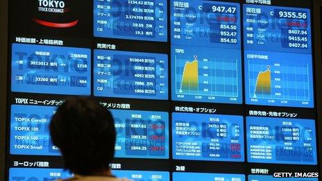 Tokyo stock exchange screens