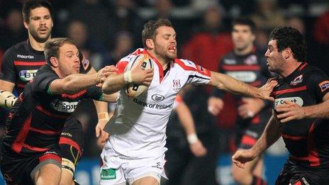 Edinburgh pair Greg Tonks and Tomas Leonardi tackle Ulster centre Darren Cave