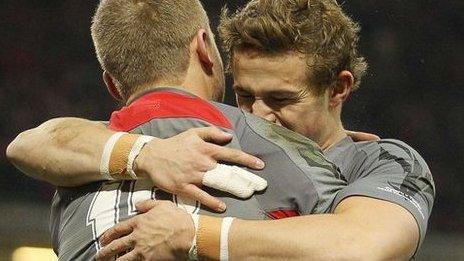 Owen Williams is congratulated by debutant Hallam Amos after scoring Wales's first try against Tonga.