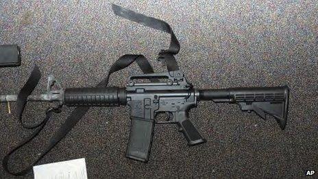 Image from report of the Sandy Hook Elementary School shooting in Newtown, Connecticut shows a gun found in the school, released 25 November 2013