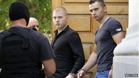 Eugen Darie, (left) and Radu Dogaru leave court Aug 2013