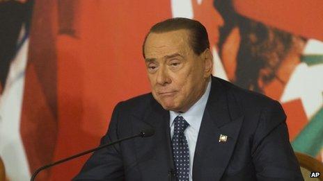 Italian Senator Silvio Berlusconi speaks at a press conference in Rome on 25 November.
