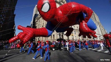 Spider-Man balloon floats down Central Park West during the 87th Macy's Thanksgiving Day Parade in New York on 28 November 2013