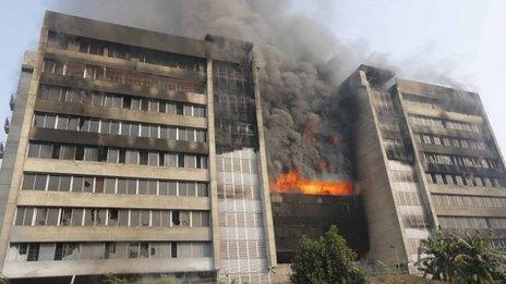 Smoke rises from the fire at the Standard Group garment factory in Gazipur