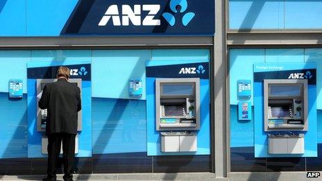 A customer using an ANZ ATM