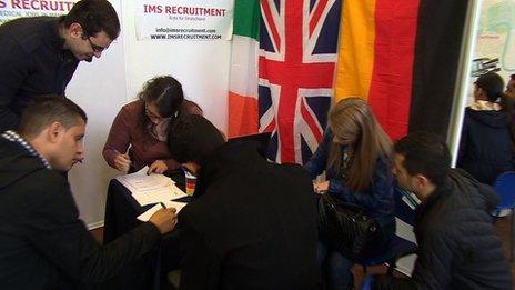 A group of Romanian jobseekers at a jobs fair in Cluj