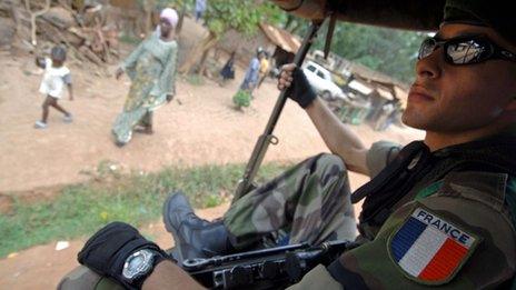 A French soldier sits in a mobile patrol in Bangui, Central African Republic, in this file photo from July 2007.