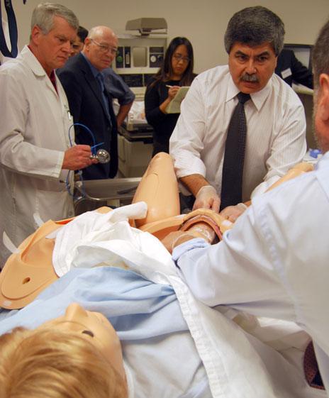 Odon demonstrates his device on a state-of-the-art mannequin