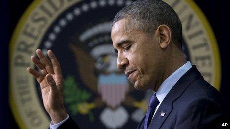 President Barack Obama waves in Washington DC on 2 December 2013