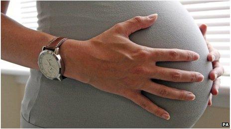 Unidentified pregnant woman