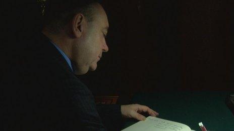 Alex Salmond signs the book of condolence